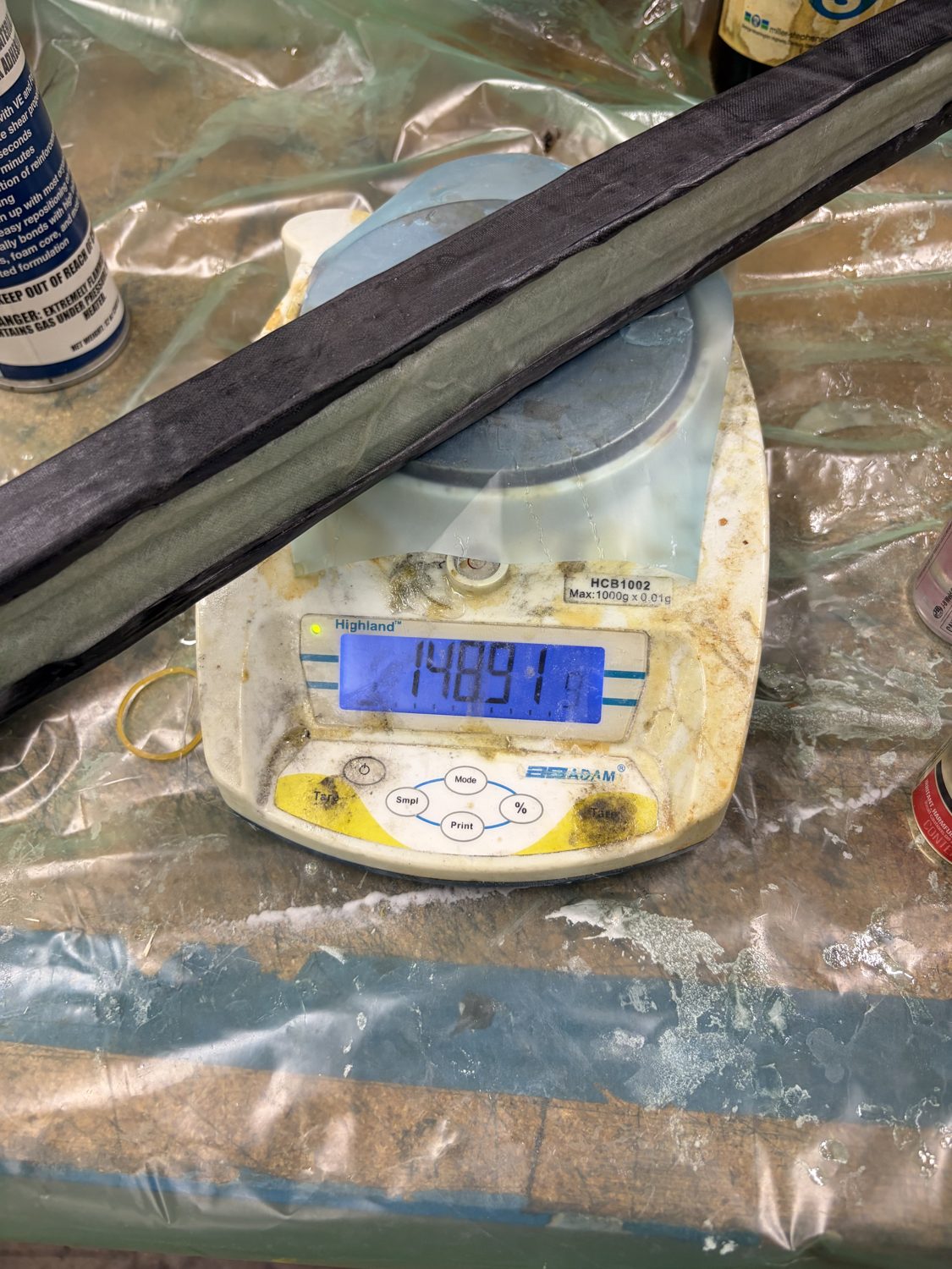 A composite beam on a lab scale before its outer carbon skin
