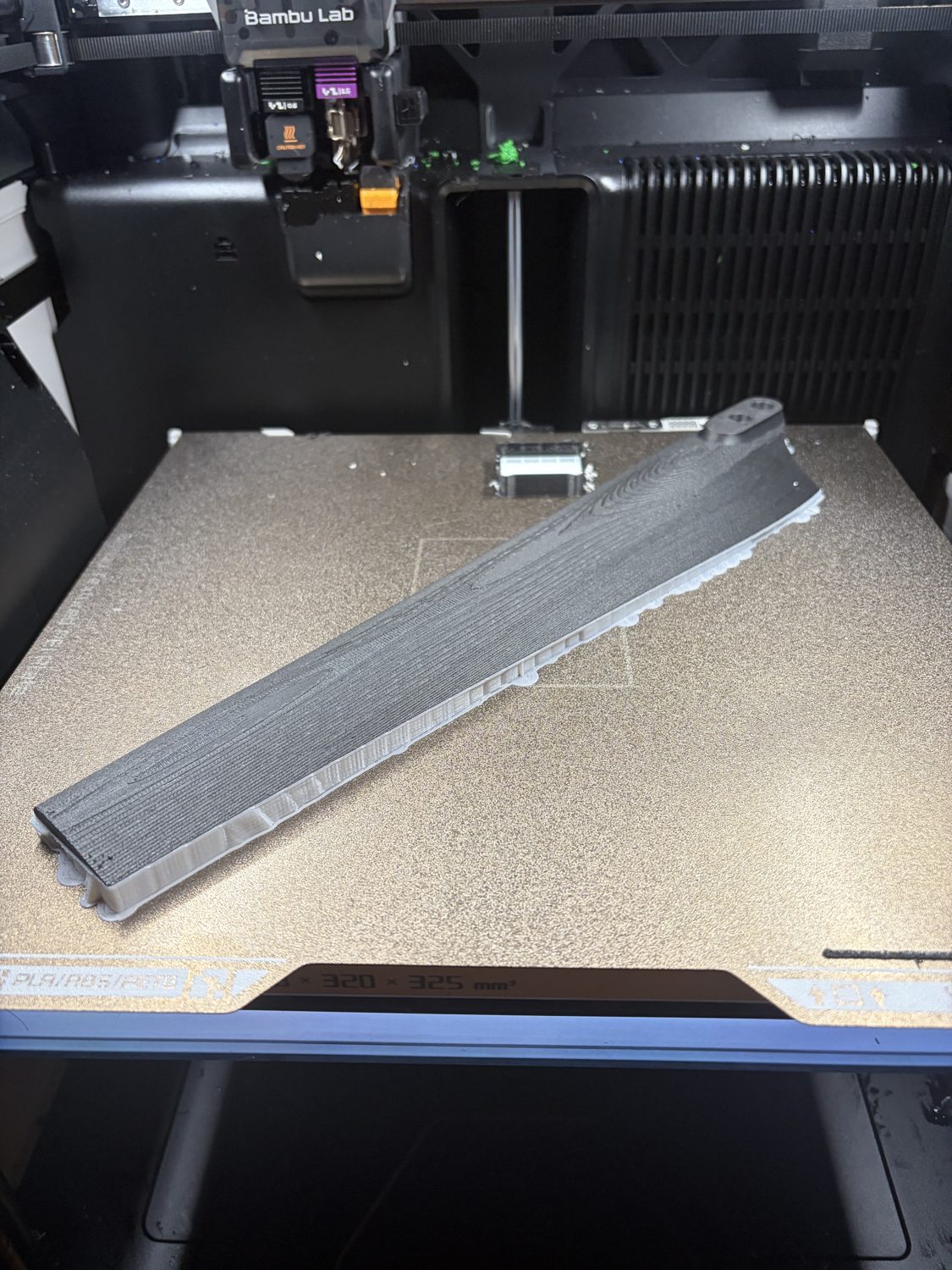 A 3D-printed scaled rotor blade on a printer bed